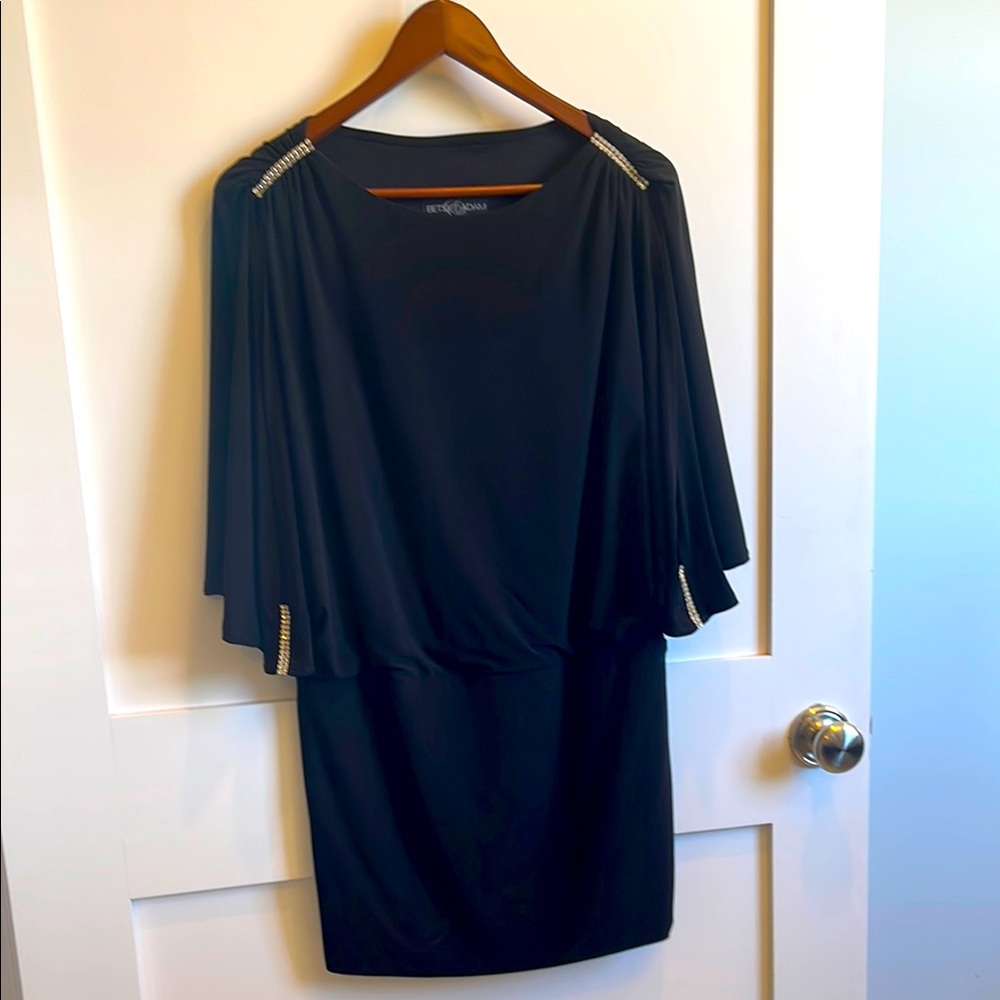 Elegant Black Dress with Embellished Shoulders
